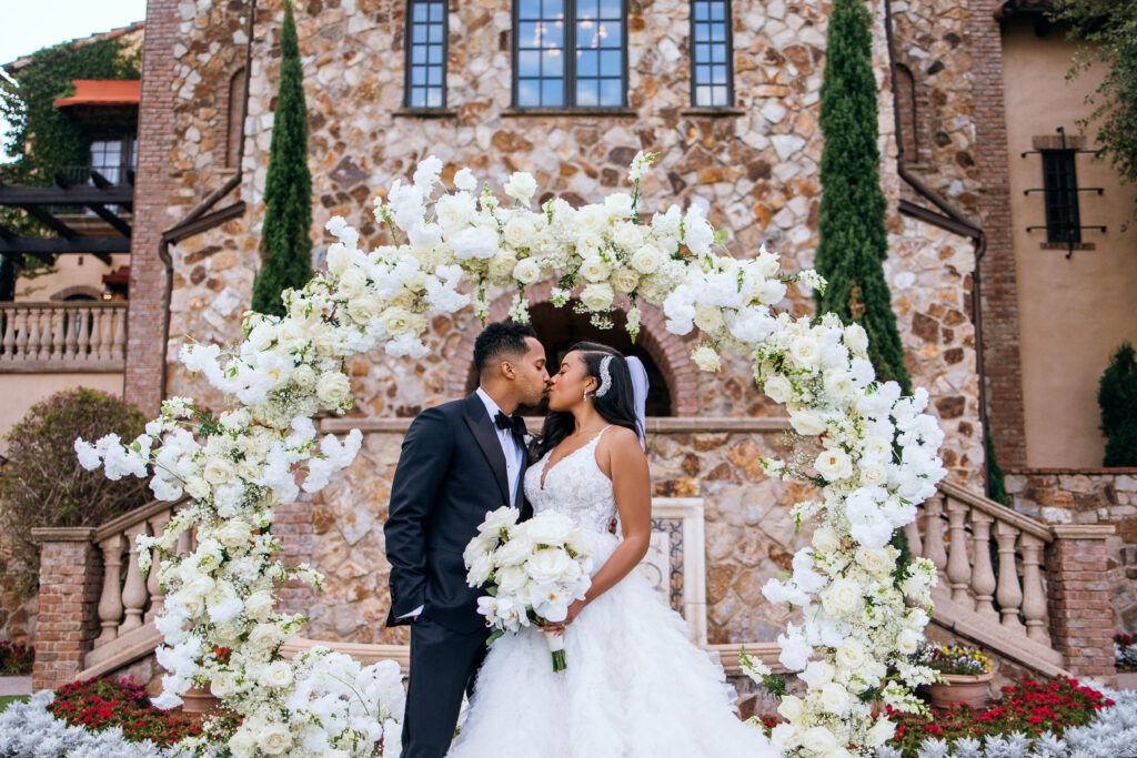 bride and groom bella collina wedding florals
